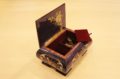 Velvet lining and brass hinge - Italian inlaid music box adorned with musical instruments