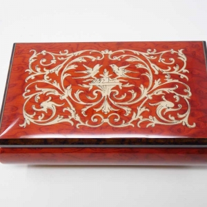 Musical jewelry box with classic inlay