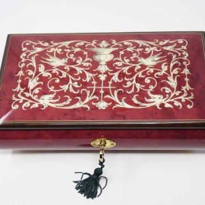 Musical jewelry box with classic inlay