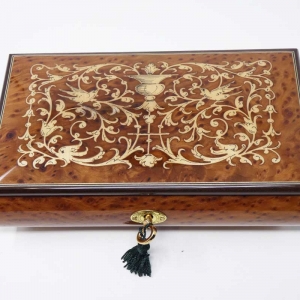 Musical jewelry box with classic inlay